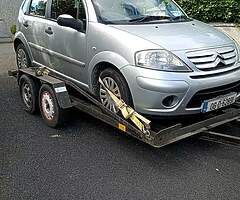 Man with jeep and car transporter/plant trailer,and closed in trailer available for transportation