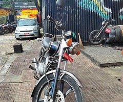 Rx 100cc.