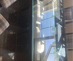 Very heavy glass table and chairs 5 foot by 31 inches cost 500 new sell for €200 ono