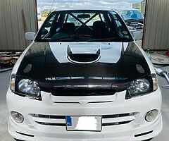 Glanza carbon bonnet and Cusco cage