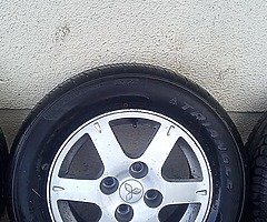 Mitsubishi wheels 4x114 tidy set of alloys 4 very good tyres 15inch