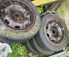 15 inch 4x108 steelies and 15 inch black 4x100 and 4x108