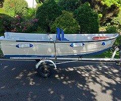 12 ft fiberglass  boat +trailer +engine