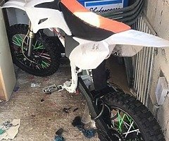 Lookinf crf 70 bigbore exhaust