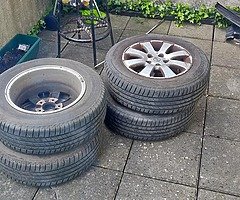 4 wheels with Bridgestone tyres
