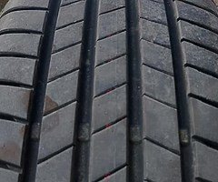 4 wheels with Bridgestone tyres