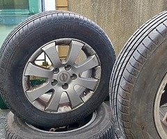 4 wheels with Bridgestone tyres