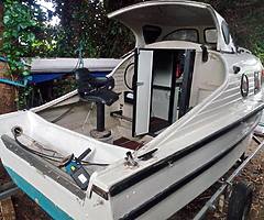 Shetland boat 535 in very good condition perfect working order.Comes with trailer and 8 hp engine .