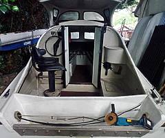 Shetland boat 535 in very good condition perfect working order.Comes with trailer and 8 hp engine .