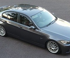Anyone have 2 20mil wheels spacers and a rear msport e90 bumper ?