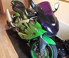Zx6r j1 footrest hanger, gear side, wanted.