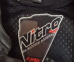 Nitro one piece leather suite